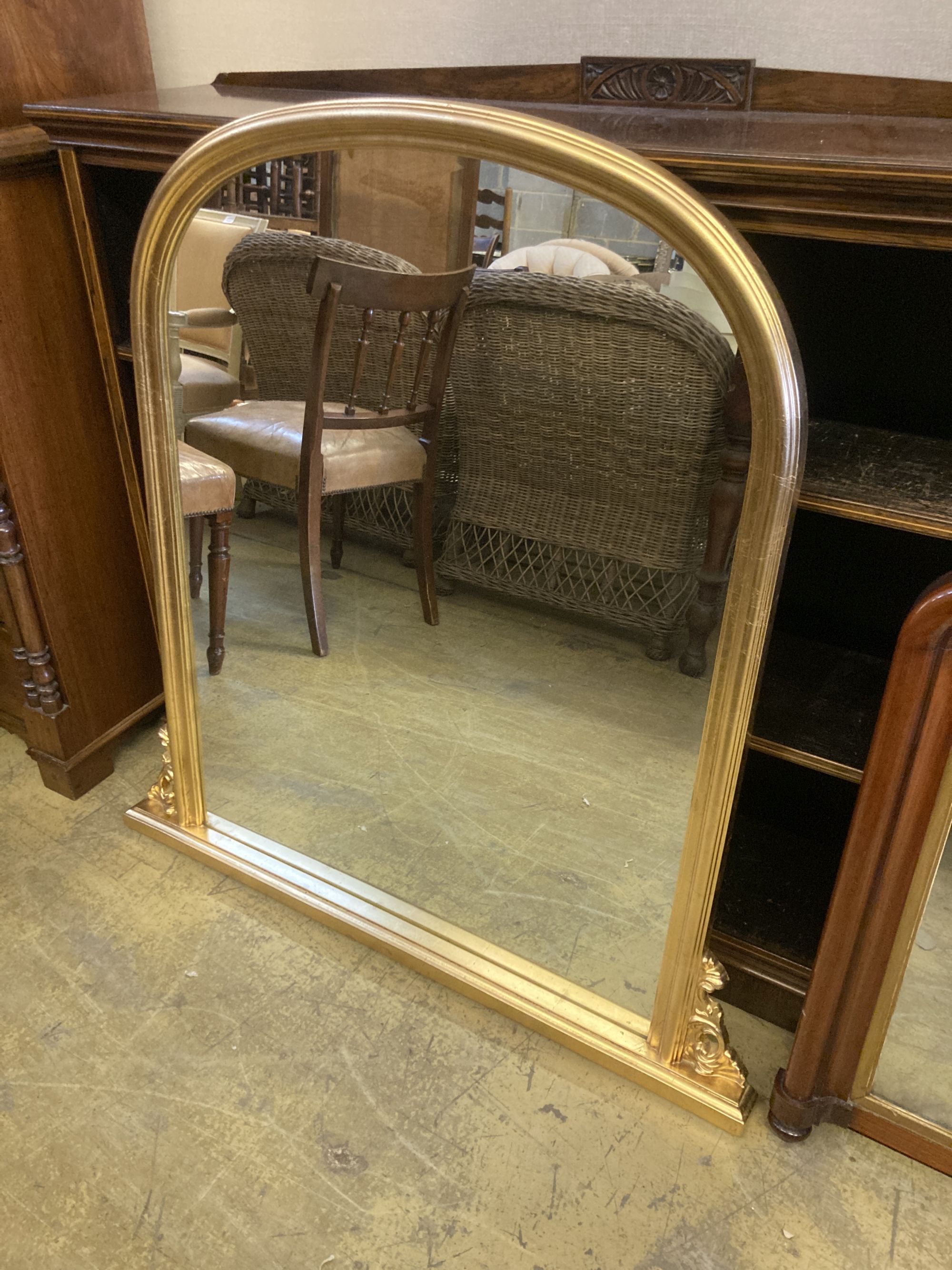 A Victorian mahogany overmantel mirror, width 102cm, height 71cm, together with a reproduction gilt framed overmantel mirror